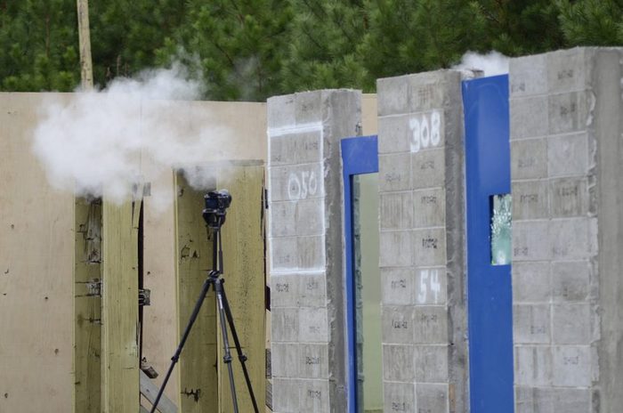 Live-fire ballistic testing of an Amidon Shield wall in progress